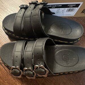 Dr. Martens Black Blaire Slide Sandals with Flower Buckle